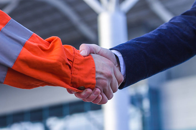 businessman-handshaking-with-worker-handshake-of-2021-09-03-20-18-13-utc-1